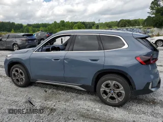 2023 BMW X1 xDrive28i with VIN WBX73EF08P5W51452, listed as a Copart auction lot 58420175 with 30,404 mi miles and Salvage title. Bid and sale history available at DreamBid. Image 2.