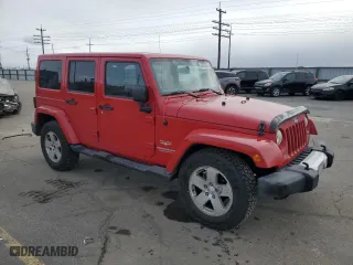2012 Jeep Wrangler Unlimited Sahara with VIN 1C4BJWEGXCL223261, listed as a Copart auction lot 49350525 with 153,256 mi miles and Salvage Title. Bid and sale history available at carsss.com. Image 4.