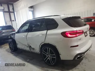 2021 BMW X5 sDrive40i with VIN 5UXCR4C09M9F61659, listed as a Copart auction lot 58670335 with Not provided miles and Salvage title. Bid and sale history available at DreamBid. Image 2.