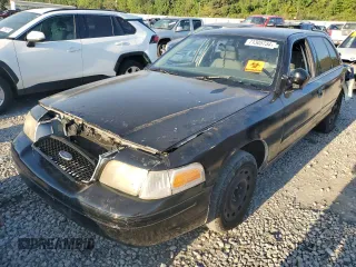 2004 Ford Police Interceptor Base w/3.27 Axle with VIN 2FAFP71WX4X149014, listed as a Copart auction lot 71305734 with 180,542 mi miles and Salvage title. Bid and sale history available at DreamBid. Image 1.