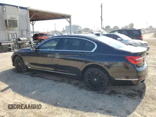 2016 BMW 7 Series 740i z VIN WBA7E2C58GG738940, wystawiony jako Copart lot #60503595 z przebiegiem 99 654 mil mil oraz Szkoda całkowita • Salvage title. Historia ofert i sprzedaży dostępna na DreamBid. Obrazek 2.