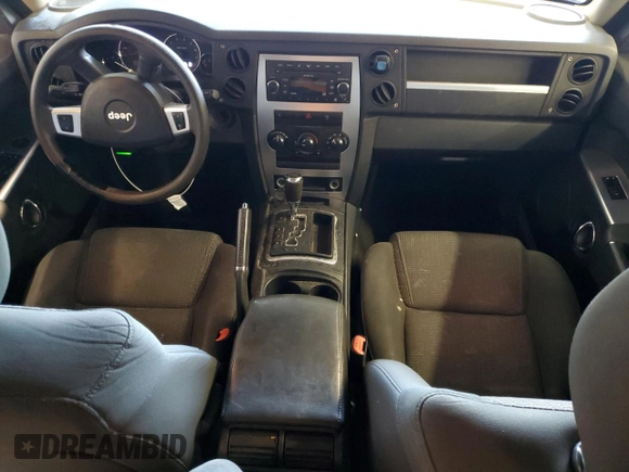2009 Jeep Commander Sport с VIN 1J8HG48K09C556499, выставлен на аукционе Copart как лот 59859515 с пробегом Не указан миль и Списание • Salvage title. История ставок и продаж доступна на DreamBid. Изображение 8.