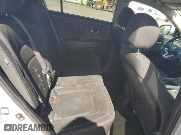 2012 Kia Sportage EX z VIN KNDPCCA26C7176313, wystawiony jako Copart lot #51994005 z przebiegiem 167 759 mil mil oraz Szkoda całkowita • Salvage title. Historia ofert i sprzedaży dostępna na DreamBid. Obrazek 11.