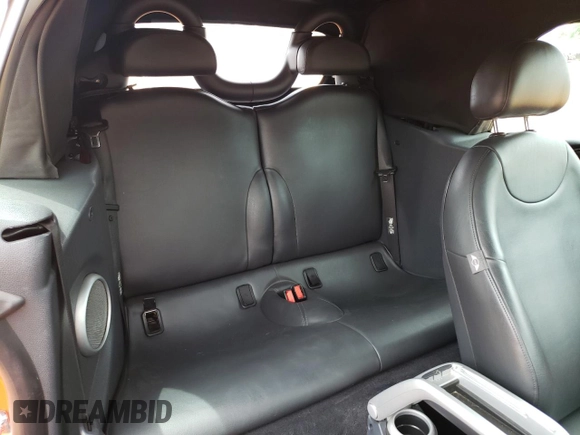 2006 MINI Convertible with VIN WMWRF335X6TF64910, listed as a Copart auction lot 60222215 with 85,761 mi miles and Salvage title. Bid and sale history available at DreamBid. Image 10.
