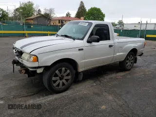 2002 Mazda B-Series Truck SX z VIN 4F4YR12D12TM25640, wystawiony jako Copart lot #58604465 z przebiegiem 301 727 mil mil oraz Szkoda całkowita • Salvage title. Historia ofert i sprzedaży dostępna na DreamBid. Obrazek 1.