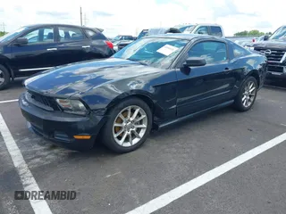2011 Ford Mustang V6 with VIN 1ZVBP8AM5B5149026, listed as a IAAI auction lot 42551126 with 230,429 mi miles and . Bid and sale history available at DreamBid. Image 2.