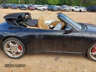 2007 Porsche 911 Carrera S z VIN WP0CB29967S775552, wystawiony jako IAAI lot #42218602 z przebiegiem 81 015 mil mil oraz . Historia ofert i sprzedaży dostępna na DreamBid. Obrazek 13.