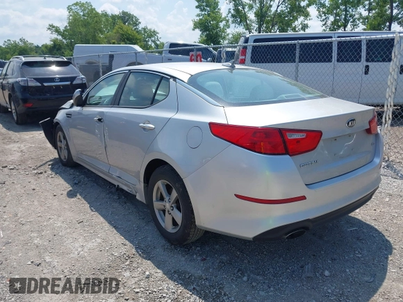 2014 Kia Optima LX with VIN 5XXGM4A76EG316577, listed as a IAAI auction lot 42594090 with 68,979 mi miles and . Bid and sale history available at DreamBid. Image 3.