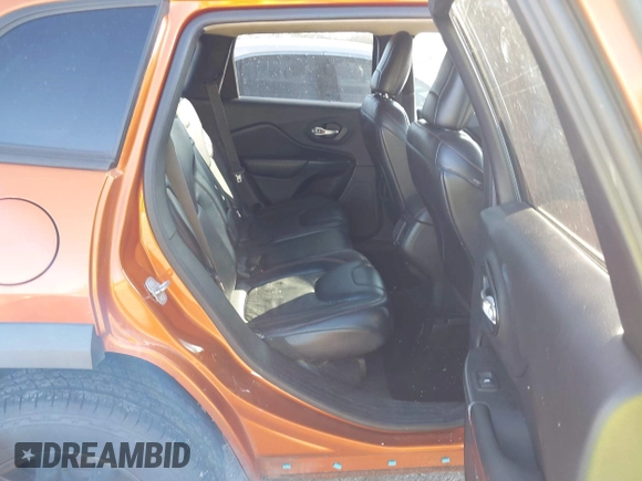 2014 Jeep Cherokee Trailhawk with VIN 1C4PJMBS4EW254879, listed as a IAAI auction lot 41550356 with 101,077 mi miles. Bid and sale history available at carsss.com. Image 8.