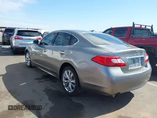 2013 Infiniti M with VIN JN1BY1AP3DM514462, listed as a IAAI auction lot 42141542 with 175,403 mi miles. Bid and sale history available at carsss.com. Image 3.