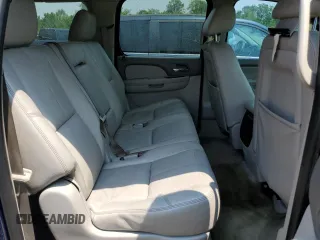 2012 Chevrolet Suburban LT z VIN 1GNSCJE09CR219299, wystawiony jako Copart lot #59689884 z przebiegiem 223 294 mil mil oraz Czysty tytuł • Clean title. Historia ofert i sprzedaży dostępna na DreamBid. Obrazek 11.