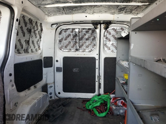 2016 Nissan NV200 S with VIN 3N6CM0KN4GK693567, listed as a Copart auction lot 57257015 with 98,877 mi miles and Salvage title. Bid and sale history available at DreamBid. Image 10.
