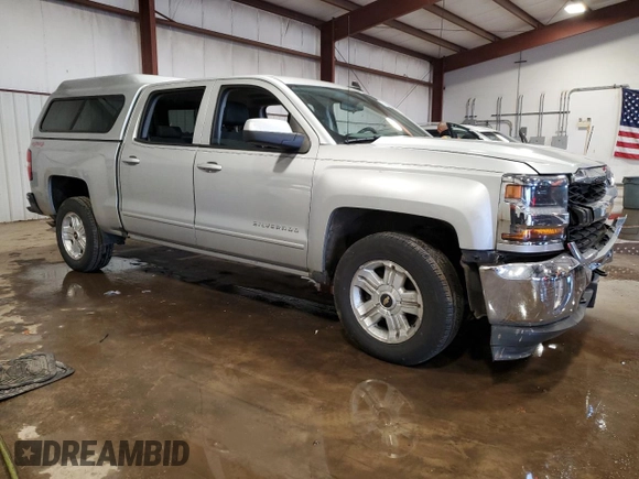 2017 Chevrolet Silverado 1500 LT with VIN 3GCUKREC3HG320455, listed as a Copart auction lot 43765005 with 119,683 mi miles and Salvage Title. Bid and sale history available at DreamBid. Image 4.