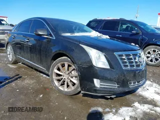 2013 Cadillac XTS Luxury with VIN 2G61P5S33D9101486, listed as a IAAI auction lot 41629349 with 141,050 mi miles. Bid and sale history available at carsss.com. Image 1.