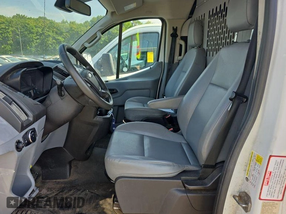 2016 Ford Transit Cargo with VIN 1FTYE1YM7GKB48730, listed as a IAAI auction lot 42846040 with 252,083 mi miles and . Bid and sale history available at DreamBid. Image 14.