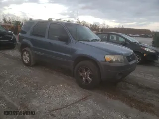 2005 Ford Escape XLT with VIN 1FMCU031X5KA51812, listed as a Copart auction lot 47661045 with 244,572 mi miles and Salvage Title. Bid and sale history available at carsss.com. Image 4.