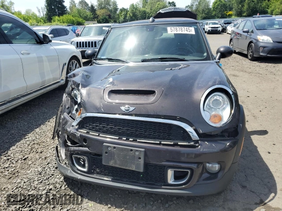 2013 MINI Convertible S with VIN WMWZP3C51DT551373, listed as a Copart auction lot 57878745 with 110,181 mi miles and Salvage title. Bid and sale history available at DreamBid. Image 5.