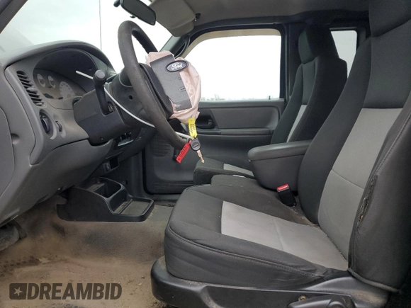 2009 Ford Ranger XLT with VIN 1FTYR44E29PA00298, listed as a Copart auction lot 77424074 with 186,750 mi miles and Clean title. Bid and sale history available at DreamBid. Image 7.