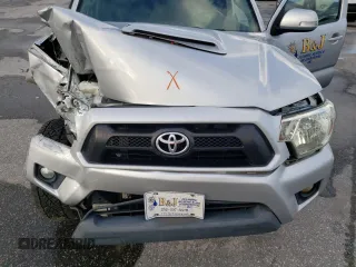 2013 Toyota Tacoma PreRunner z VIN 3TMJU4GN7DM155651, wystawiony jako Copart lot #47528115 z przebiegiem 195 328 mil mil oraz Szkoda całkowita • Salvage title. Historia ofert i sprzedaży dostępna na DreamBid. Obrazek 11.