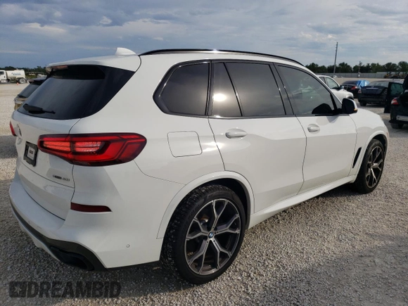 2020 BMW X5 sDrive40i with VIN 5UXCR4C02LLW63576, listed as a Copart auction lot 71912802 with 27,686 mi miles. Bid and sale history available at carsss.com. Image 3.