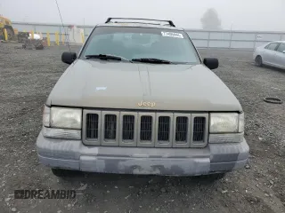1997 Jeep Grand Cherokee Laredo with VIN 1J4GZ58Y5VC637350, listed as a Copart auction lot 77405444 with 182,482 mi miles and Clean Title. Bid and sale history available at carsss.com. Image 5.