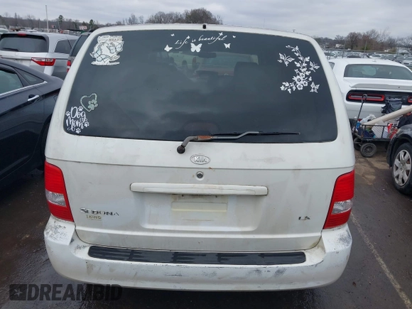 2004 Kia Sedona LX with VIN KNDUP131446537660, listed as a IAAI auction lot 41526183 with 282,891 mi miles. Bid and sale history available at carsss.com. Image 16.