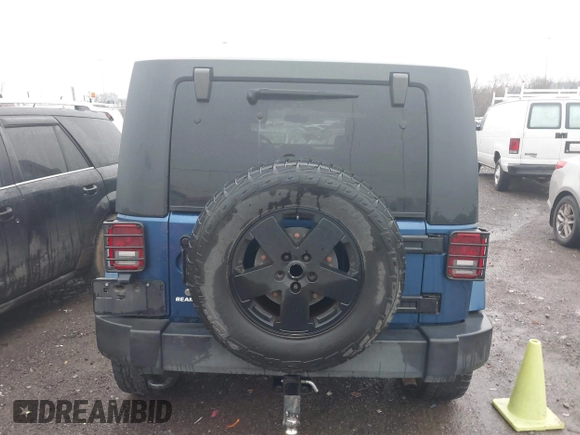 2010 Jeep Wrangler Unlimited Sahara with VIN 1J4BA5H17AL166915, listed as a IAAI auction lot 41561508 with 252,337 mi miles. Bid and sale history available at carsss.com. Image 16.