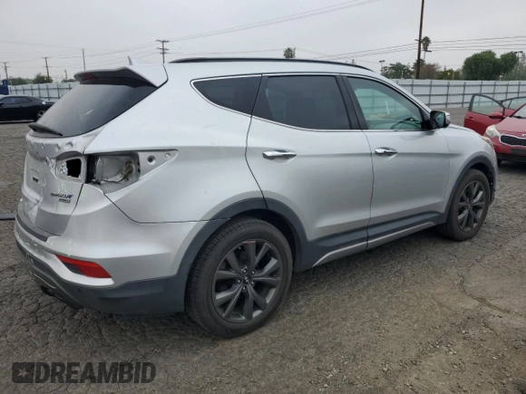 2018 Hyundai Santa Fe Ultimate с VIN 5XYZW4LA5JG513869, выставлен на аукционе Copart как лот 54176545 с пробегом 150 286 миль миль и Списание • Salvage title. История ставок и продаж доступна на DreamBid. Изображение 3.