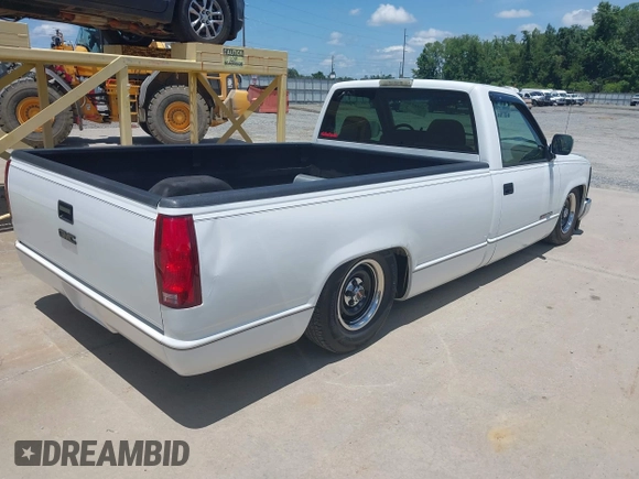 1994 GMC Sierra 1500 z VIN 1GTFC24KXRE522028, wystawiony jako IAAI lot #42463380 z przebiegiem 153 411 mil mil oraz . Historia ofert i sprzedaży dostępna na DreamBid. Obrazek 4.