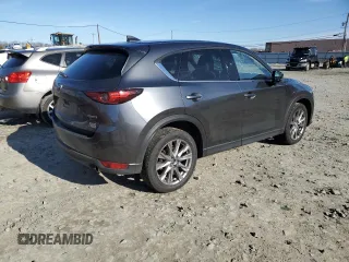 2020 Mazda CX-5 Grand Touring with VIN JM3KFBDM6L0853403, listed as a Copart auction lot 45658645 with 206,323 mi miles and Salvage Title. Bid and sale history available at carsss.com. Image 3.