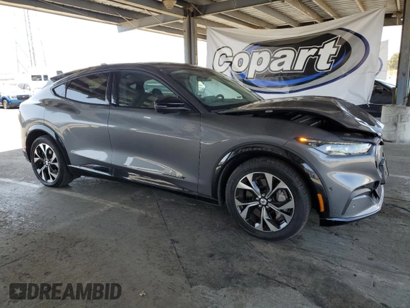 2023 Ford Mustang Mach-E Premium with VIN 3FMTK3SU2PMA97939, listed as a Copart auction lot 61383185 with 53,236 mi miles and Salvage title. Bid and sale history available at DreamBid. Image 4.