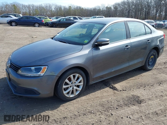 2011 Volkswagen Jetta Sedan SE w/Convenience & Sunroof PZEV with VIN 3VWDZ7AJ1BM379918, listed as a IAAI auction lot 41788875 with 999,999 mi miles. Bid and sale history available at carsss.com. Image 2.