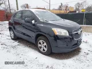 2016 Chevrolet Trax LS with VIN KL7CJNSB5GB533060, listed as a IAAI auction lot 41236426 with 124,457 mi miles. Bid and sale history available at carsss.com. Image 1.