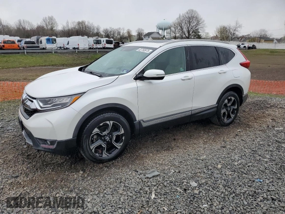 2019 Honda CR-V Touring with VIN 2HKRW2H91KH633732, listed as a Copart auction lot 52750975 with 58,642 mi miles and Salvage Title. Bid and sale history available at carsss.com. Image 1.