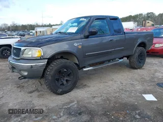 2003 Ford F-150 XL with VIN 1FTRX18L93NA51382, listed as a IAAI auction lot 41804153 with Not provided miles and . Bid and sale history available at DreamBid. Image 2.