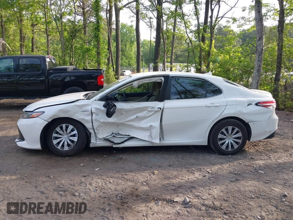 2019 Toyota Camry Hybrid LE z VIN 4T1B31HK4KU005351, wystawiony jako IAAI lot #42162802 z przebiegiem 89 187 mil mil oraz . Historia ofert i sprzedaży dostępna na DreamBid. Obrazek 14.