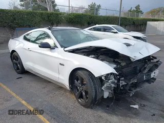 2021 Ford Mustang GT with VIN 1FA6P8CF2M5140392, listed as a IAAI auction lot 41557104 with 33,803 mi miles. Bid and sale history available at carsss.com. Image 1.