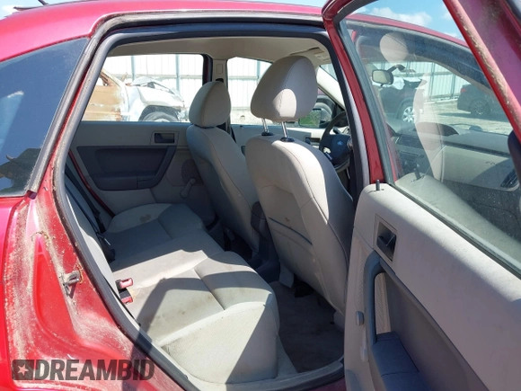 2009 Ford Focus S with VIN 1FAHP34N69W102568, listed as a IAAI auction lot 42137185 with 113,099 mi miles. Bid and sale history available at carsss.com. Image 8.