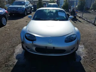 2007 Mazda MX-5 Miata Sport z VIN JM1NC25F170135777, wystawiony jako IAAI lot #41746586 z przebiegiem 107 302 mil mil oraz . Historia ofert i sprzedaży dostępna na DreamBid. Obrazek 6.