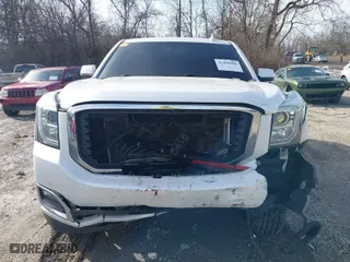 2016 GMC Yukon XL Denali with VIN 1GKS2HKJ0GR204251, listed as a IAAI auction lot 41490984 with 133,331 mi miles. Bid and sale history available at carsss.com. Image 13.
