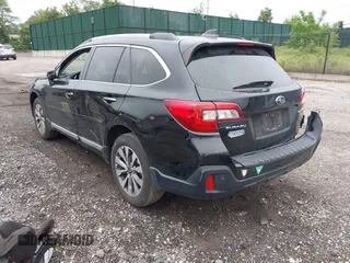 2018 Subaru Outback Touring with VIN 4S4BSETCXJ3232171, listed as a IAAI auction lot 42470956 with 124,650 mi miles and . Bid and sale history available at DreamBid. Image 3.