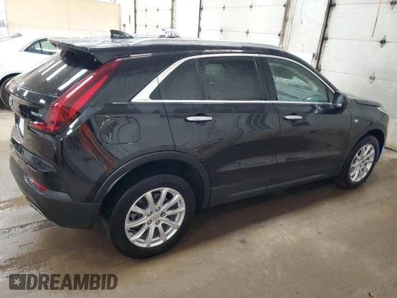 2022 Cadillac XT4 AWD Luxury with VIN 1GYFZBR45NF145986, listed as a Copart auction lot 79198274 with 23,477 mi miles and Salvage Title. Bid and sale history available at carsss.com. Image 3.