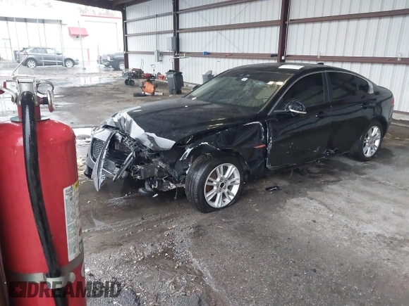 2017 Jaguar XE 25t Premium with VIN SAJAD4BG7HA966895, listed as a IAAI auction lot 41288998 with 158,391 mi miles. Bid and sale history available at carsss.com. Image 2.