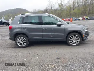 2013 Volkswagen Tiguan SE with VIN WVGAV7AX9DW547633, listed as a IAAI auction lot 42009704 with 51,826 mi miles and . Bid and sale history available at DreamBid. Image 13.