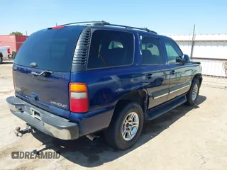 2002 Chevrolet Tahoe LT with VIN 1GNEC13Z52R257092, listed as a IAAI auction lot 41894646 with 333,103 mi miles. Bid and sale history available at carsss.com. Image 4.
