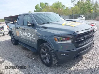 2021 Ram 1500 Big Horn with VIN 1C6SRFBT6MN561862, listed as a IAAI auction lot 39020941 with 71,959 mi miles and . Bid and sale history available at DreamBid. Image 1.