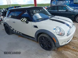 2007 MINI Hardtop with VIN WMWMF33557TL67653, listed as a IAAI auction lot 42581219 with 147,115 mi miles and . Bid and sale history available at DreamBid. Image 1.