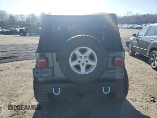 2002 Jeep Wrangler Sport with VIN 1J4FA49S22P703610, listed as a Copart auction lot 50900605 with 70,045 mi miles and Salvage Title. Bid and sale history available at carsss.com. Image 6.