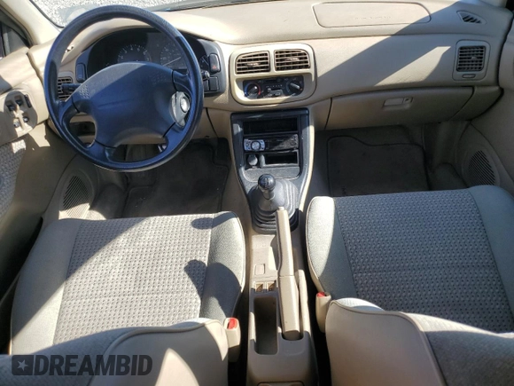 1997 Subaru Impreza L with VIN JF1GF4352VG821519, listed as a Copart auction lot 76420034 with 57,600 mi miles and Clean title. Bid and sale history available at DreamBid. Image 8.