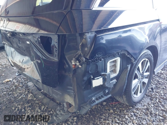 2014 Honda Odyssey Touring with VIN 5FNRL5H94EB110590, listed as a IAAI auction lot 42092929 with 242,338 mi miles and . Bid and sale history available at DreamBid. Image 19.